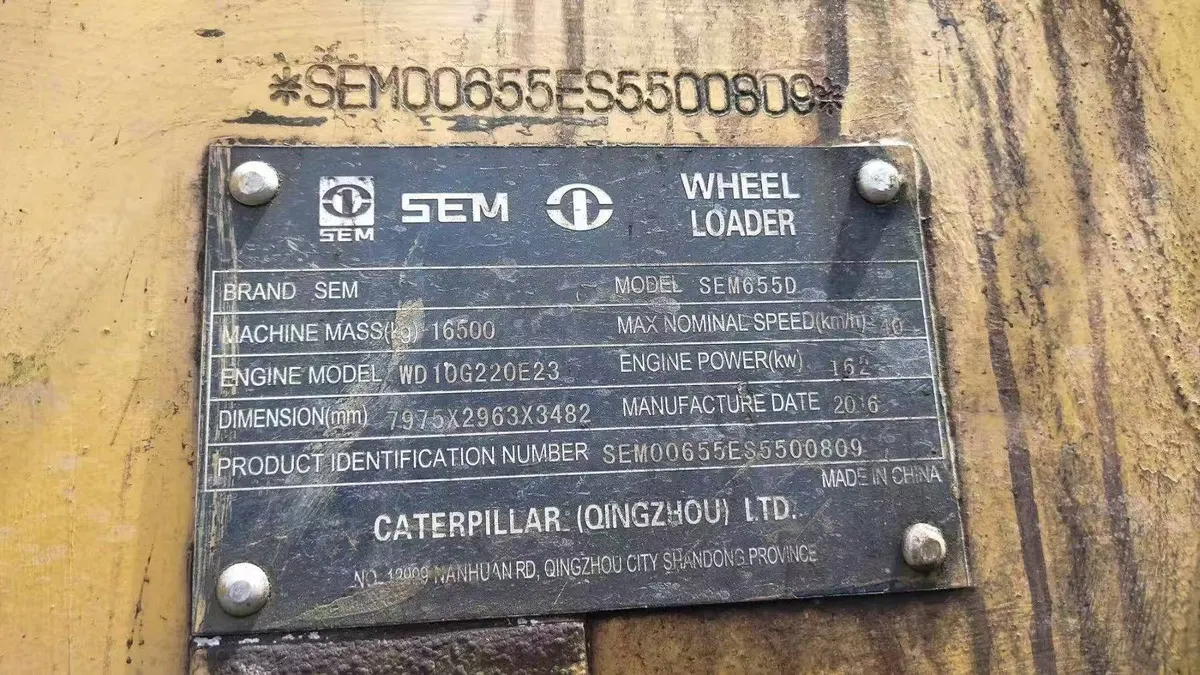 SEM 655D wheel loader machine nameplate showing model, engine model and product identification number