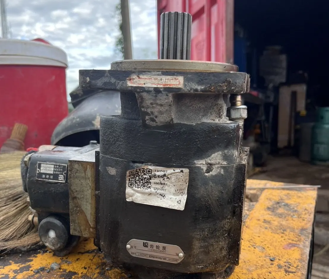 Used hydraulic gear pump photographed as an identification reference for spare part matching
