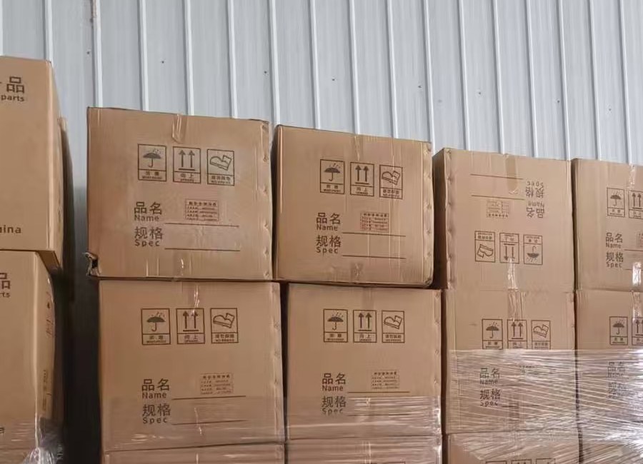 Parts packed and sealed in cartons at the Sagatruck warehouse in Jinan before shipping